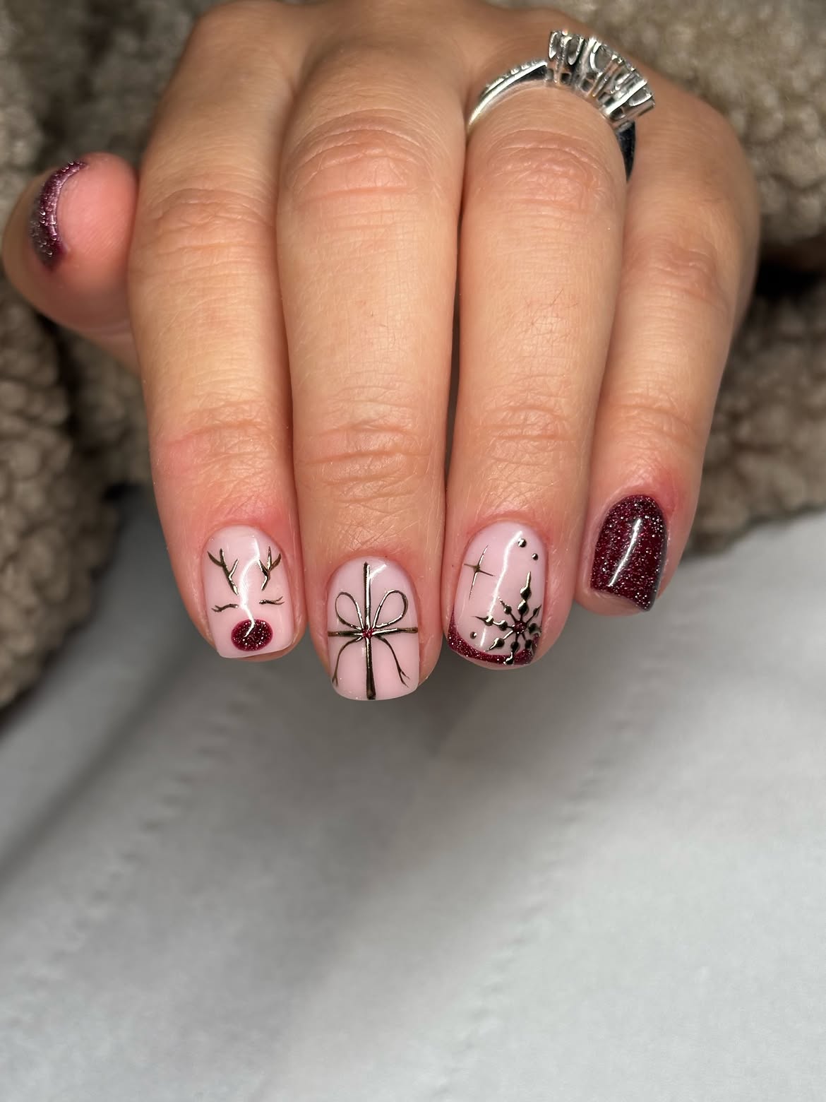 Cute Pink Christmas Reindeer and Snowflakes Nails
