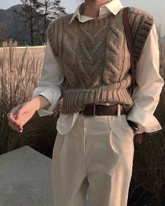 Cable knit vest over white shirt with light trousers Cable knit vest over white shirt with light trousers — Dark Academia Outfits