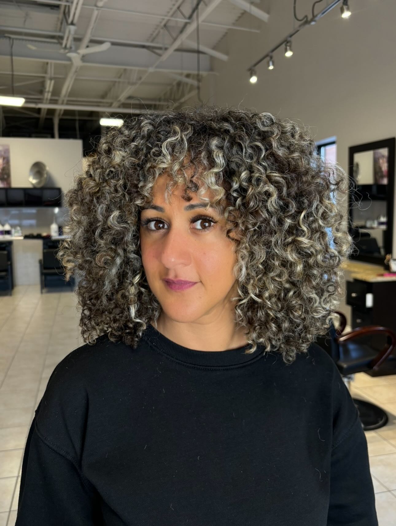 Defined Ash Blonde Curly Lob With Face Framing