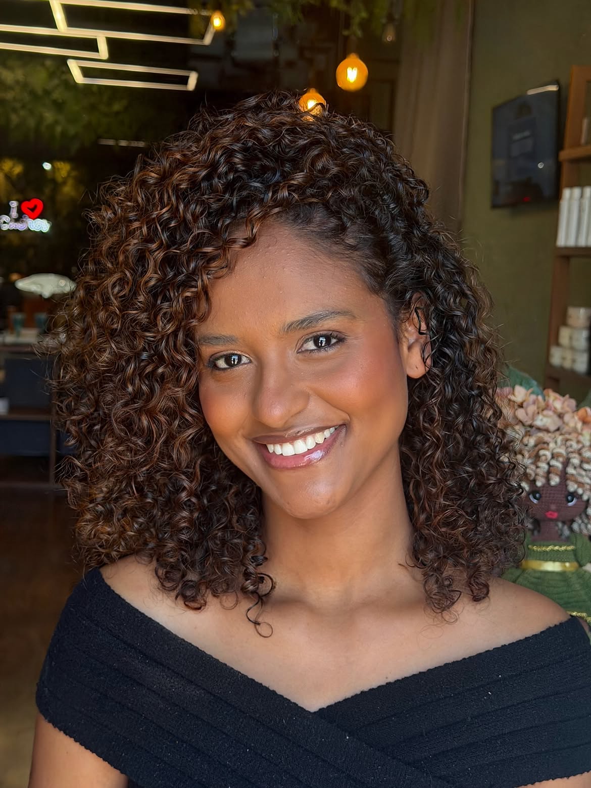 Defined Honey Brown Curls With Face-Framing Layers