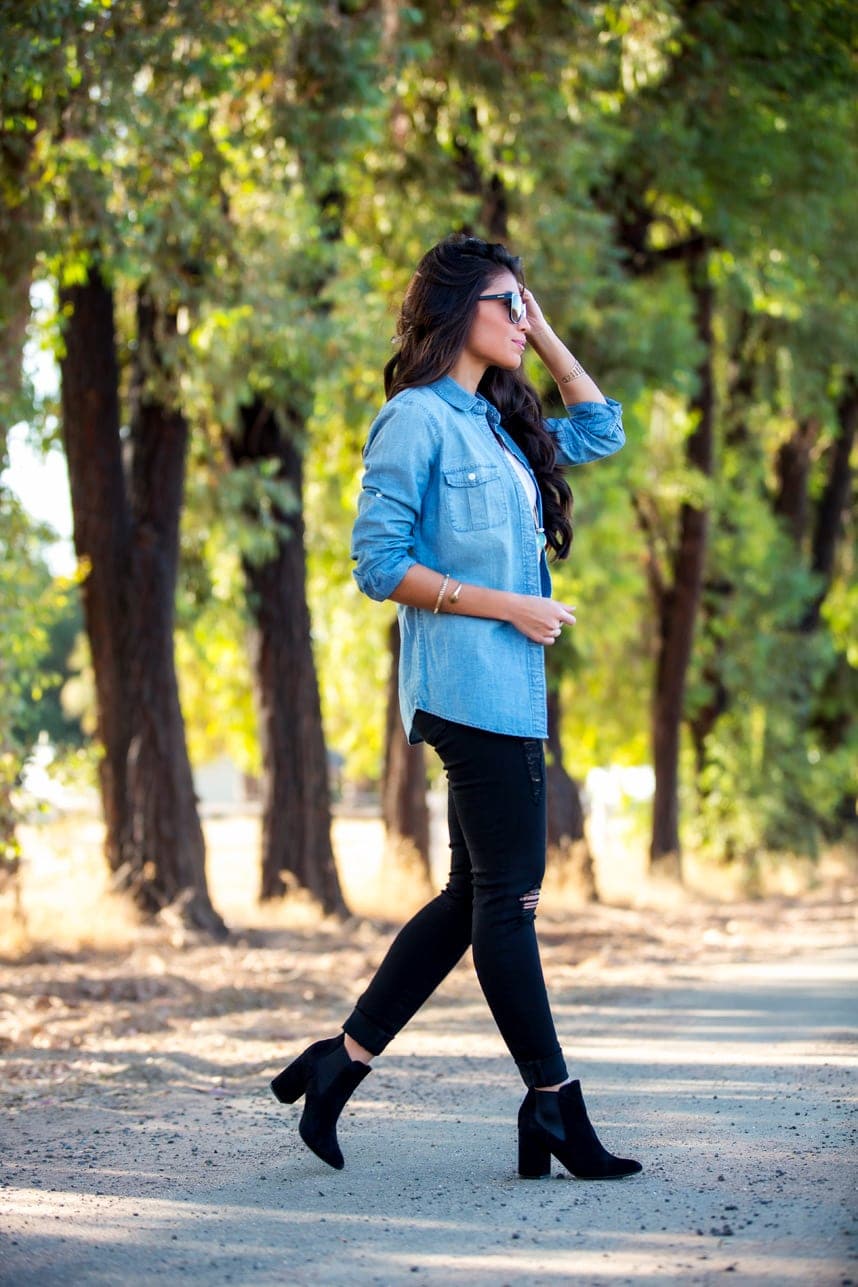 Light blue denim shirt with distressed black jeans Light blue denim shirt with distressed black jeans — Denim Top Outfit