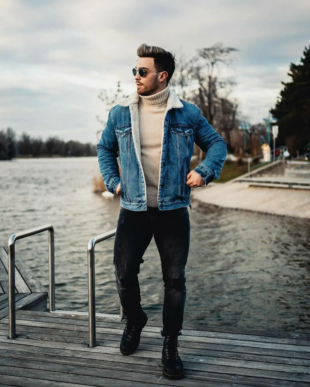 Denim Trucker Jacket With Cream Turtleneck And Black Jeans
