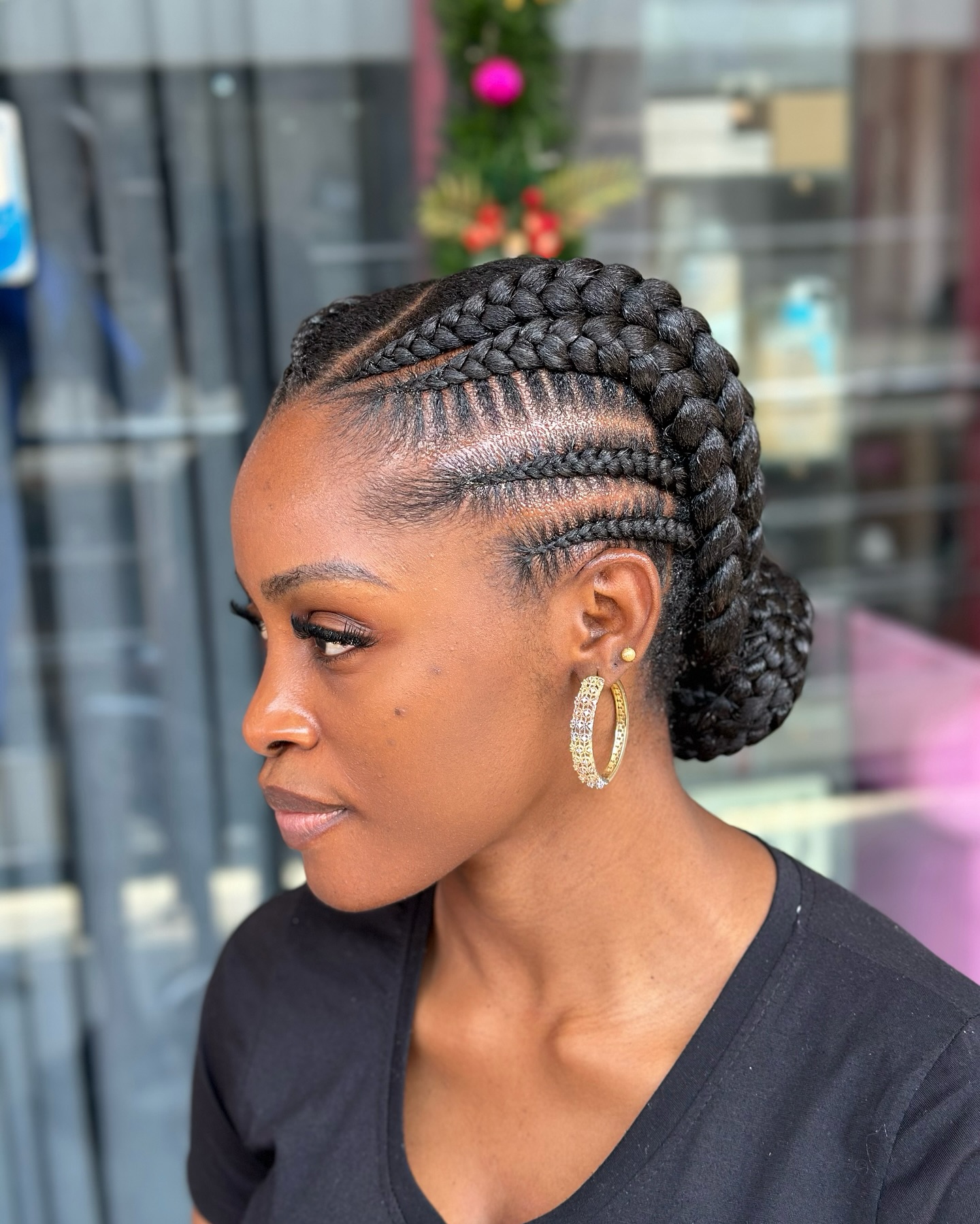 Elegant Stitched Braids Into Low Bun