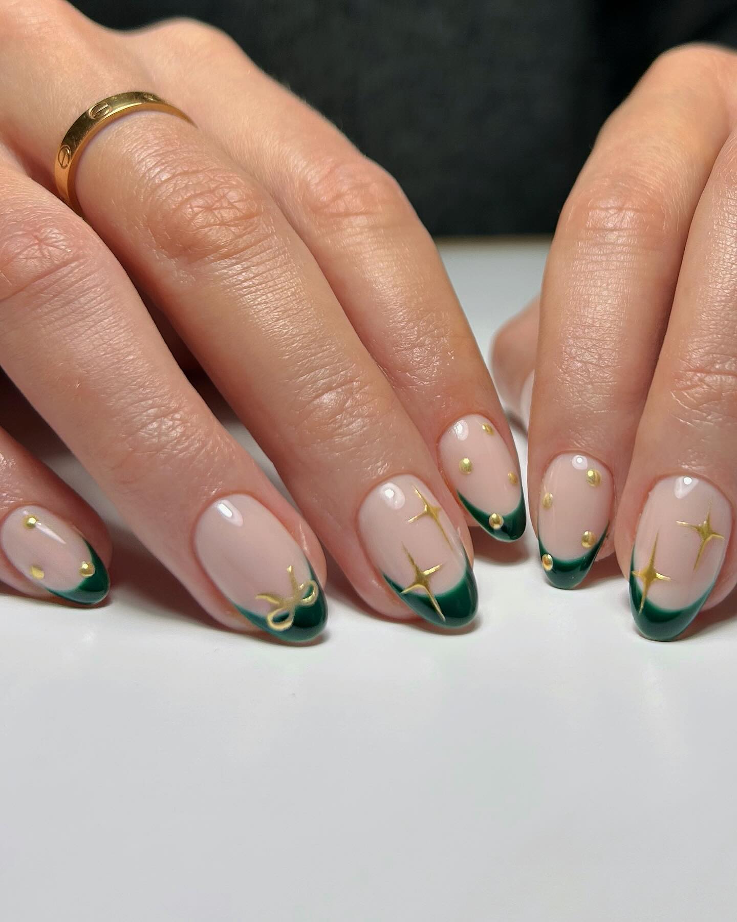Emerald Green French Tip Oval Nails with Gold Accents