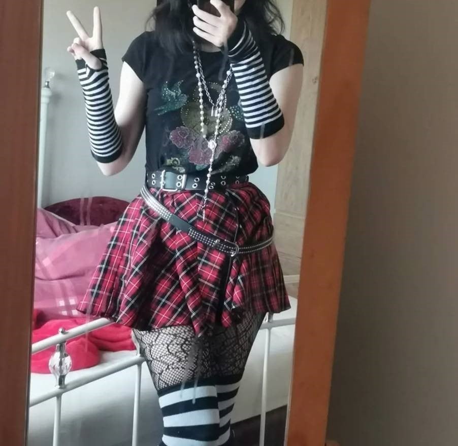 Graphic Tee With Red Plaid Skirt And Fishnets Graphic Tee With Red Plaid Skirt And Fishnets — Emo Outfits
