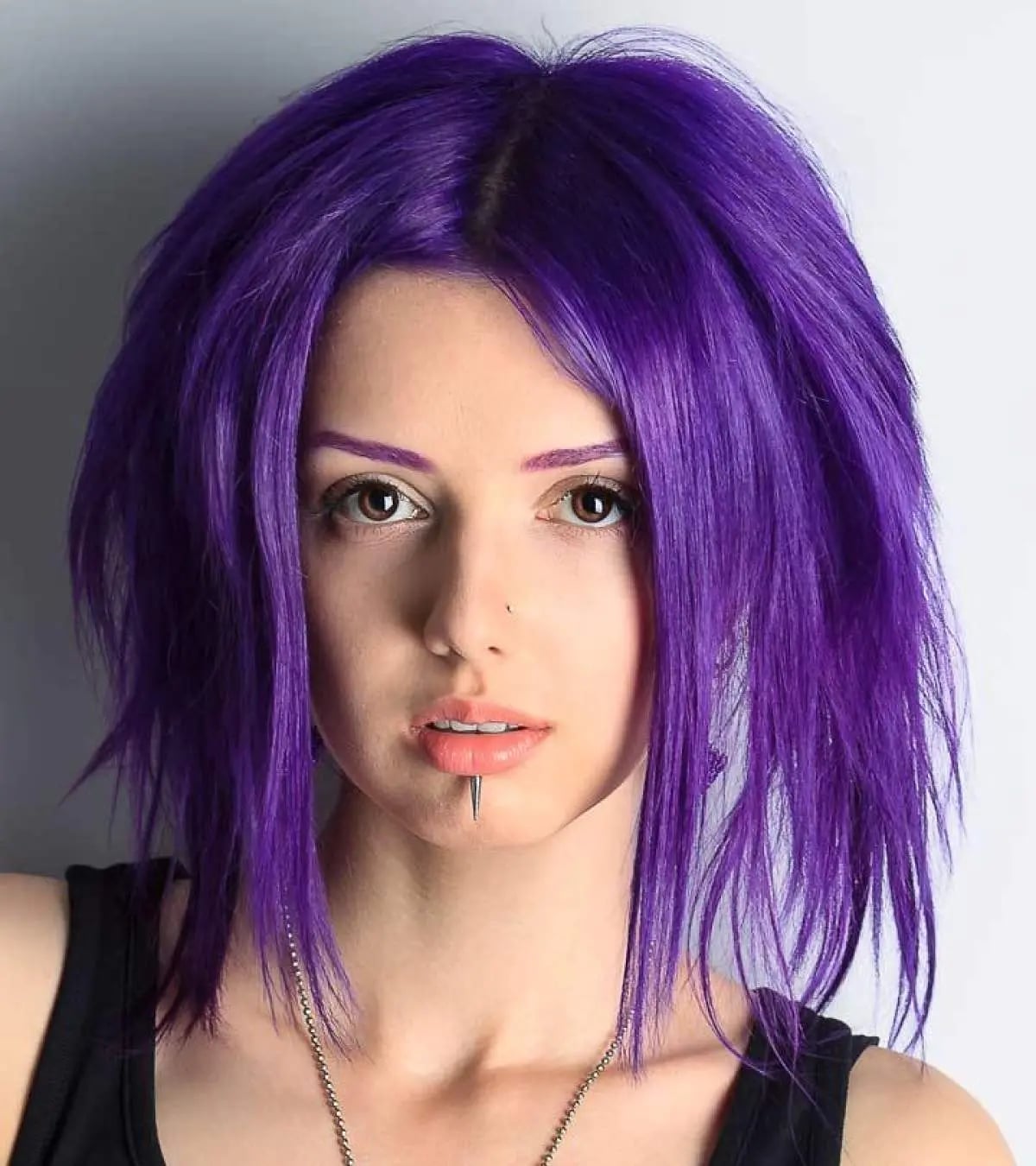 Purple choppy hairstyle with lip ring and chain necklace Purple choppy hairstyle with lip ring and chain necklace — Emo Style
