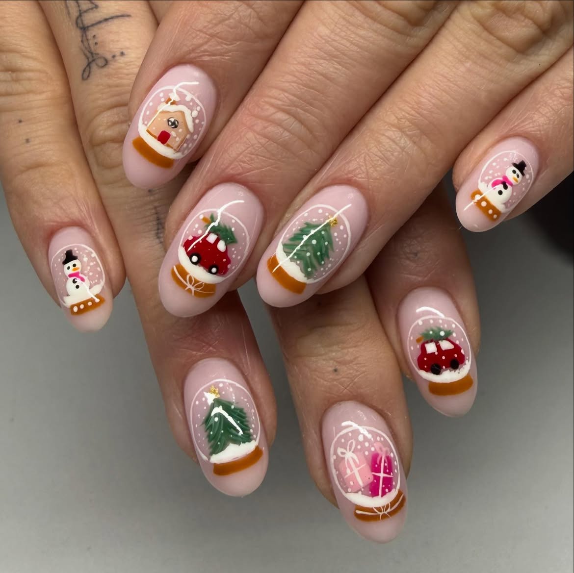 Enchanting Snow Globe Christmas Nail Art