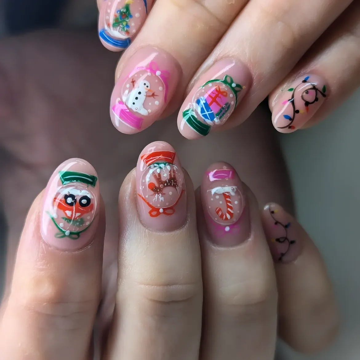 Enchanting Snow Globe Christmas Nail Art