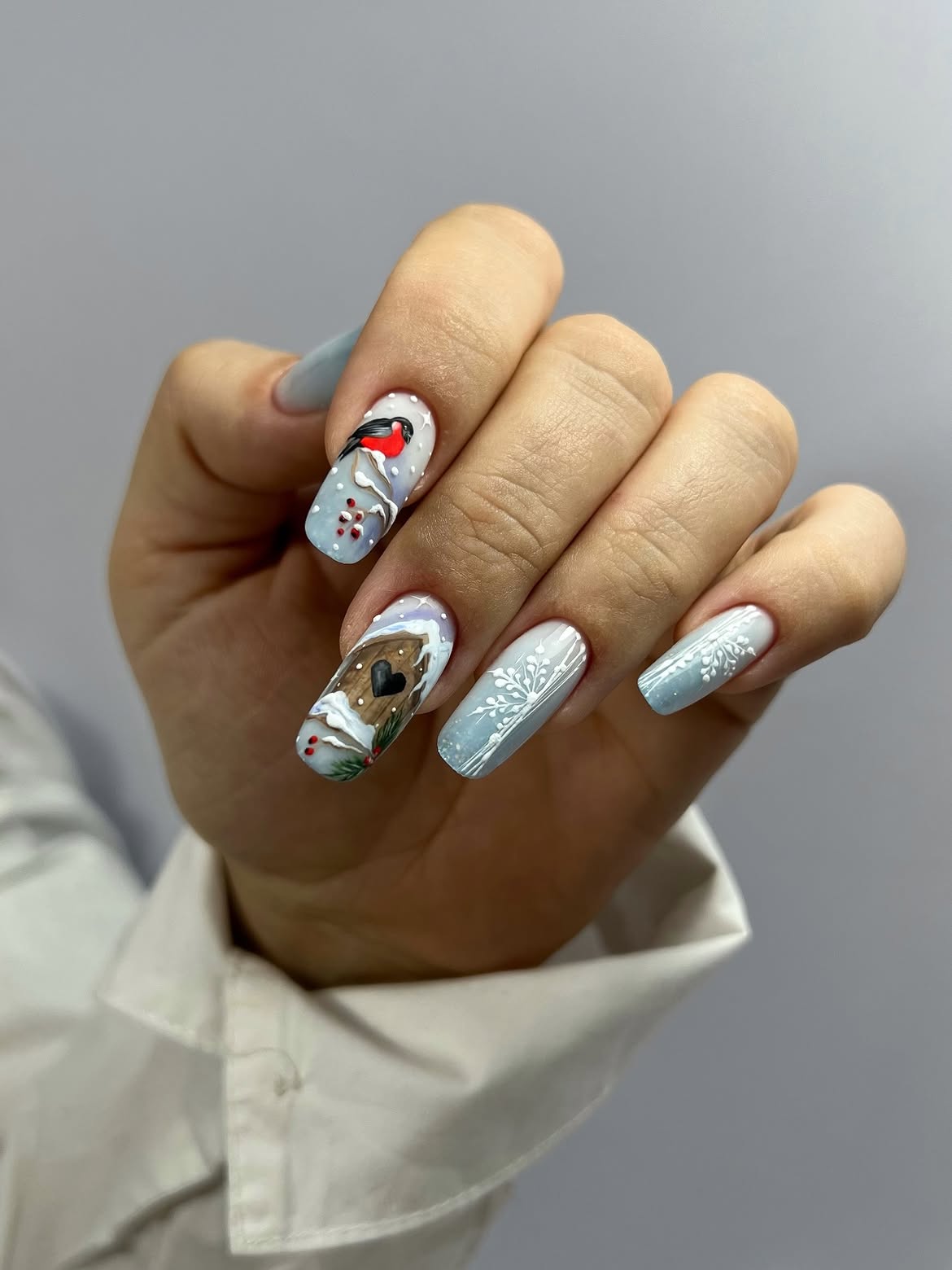 Enchanting Winter Birdhouse Nail Art Design