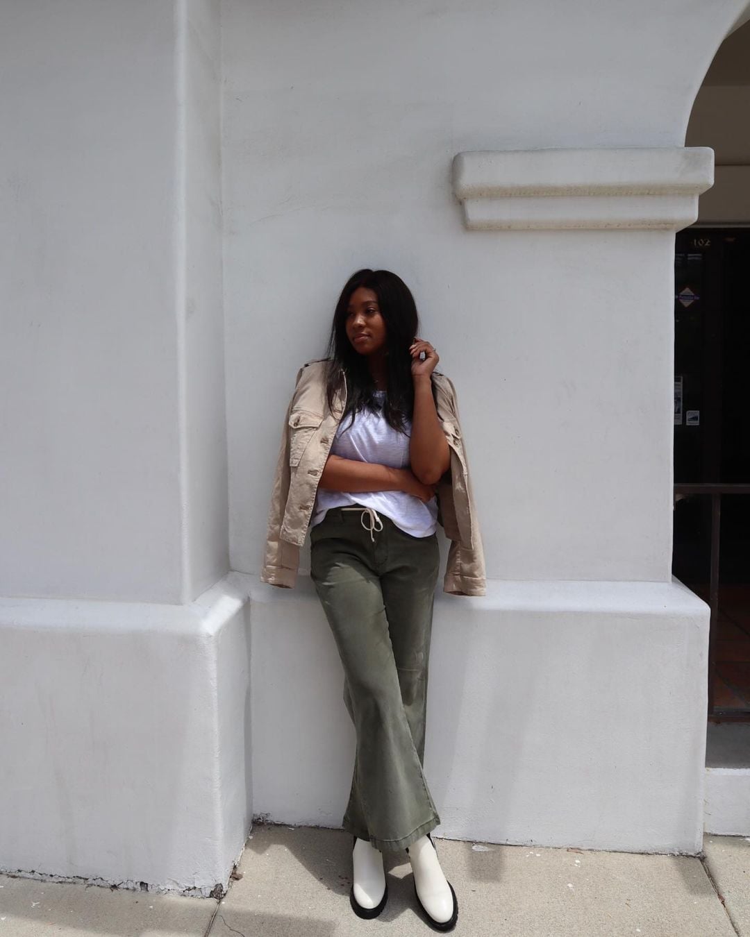 Olive Green Flared Trousers White Tee and Beige Jacket Olive Green Flared Trousers White Tee and Beige Jacket — Errands Outfits