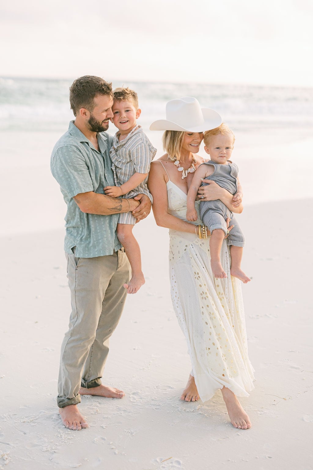 Eyelet sundress with a white hat for beach photos Eyelet sundress with a white hat for beach photos — Family Photo Outfits
