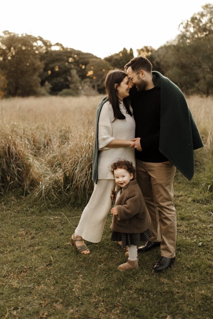 Neutral tones with a draped knit shawl for family portraits Neutral tones with a draped knit shawl for family portraits — Family Photo Outfits