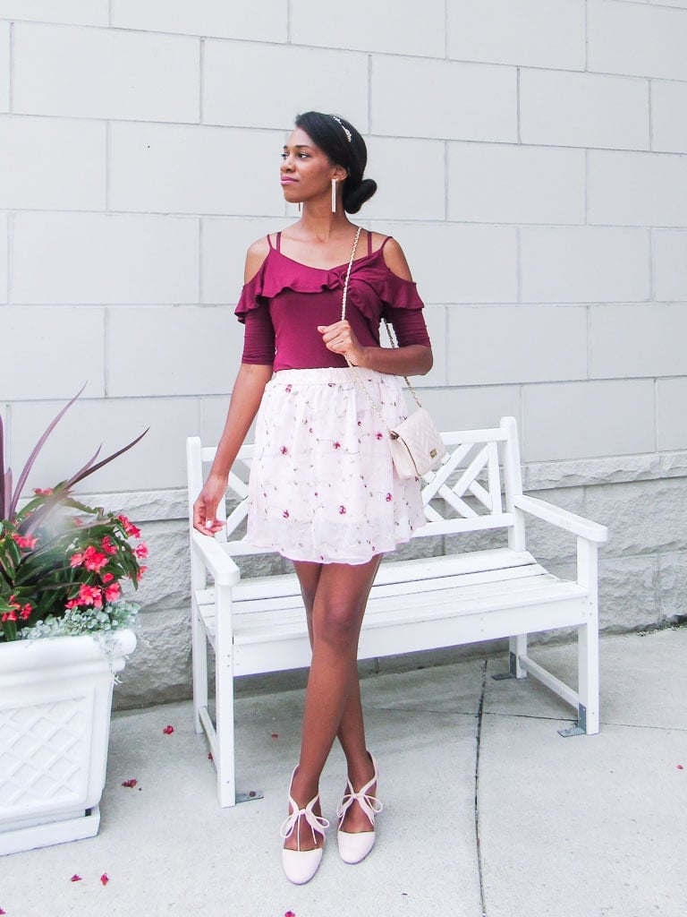 A burgundy cold-shoulder top with ruffles and a white floral skirt A burgundy cold-shoulder top with ruffles and a white floral skirt — Feminine Style