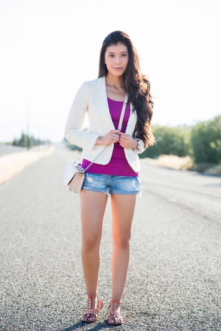 A white textured blazer with purple tank top and denim shorts A white textured blazer with purple tank top and denim shorts — Feminine Style