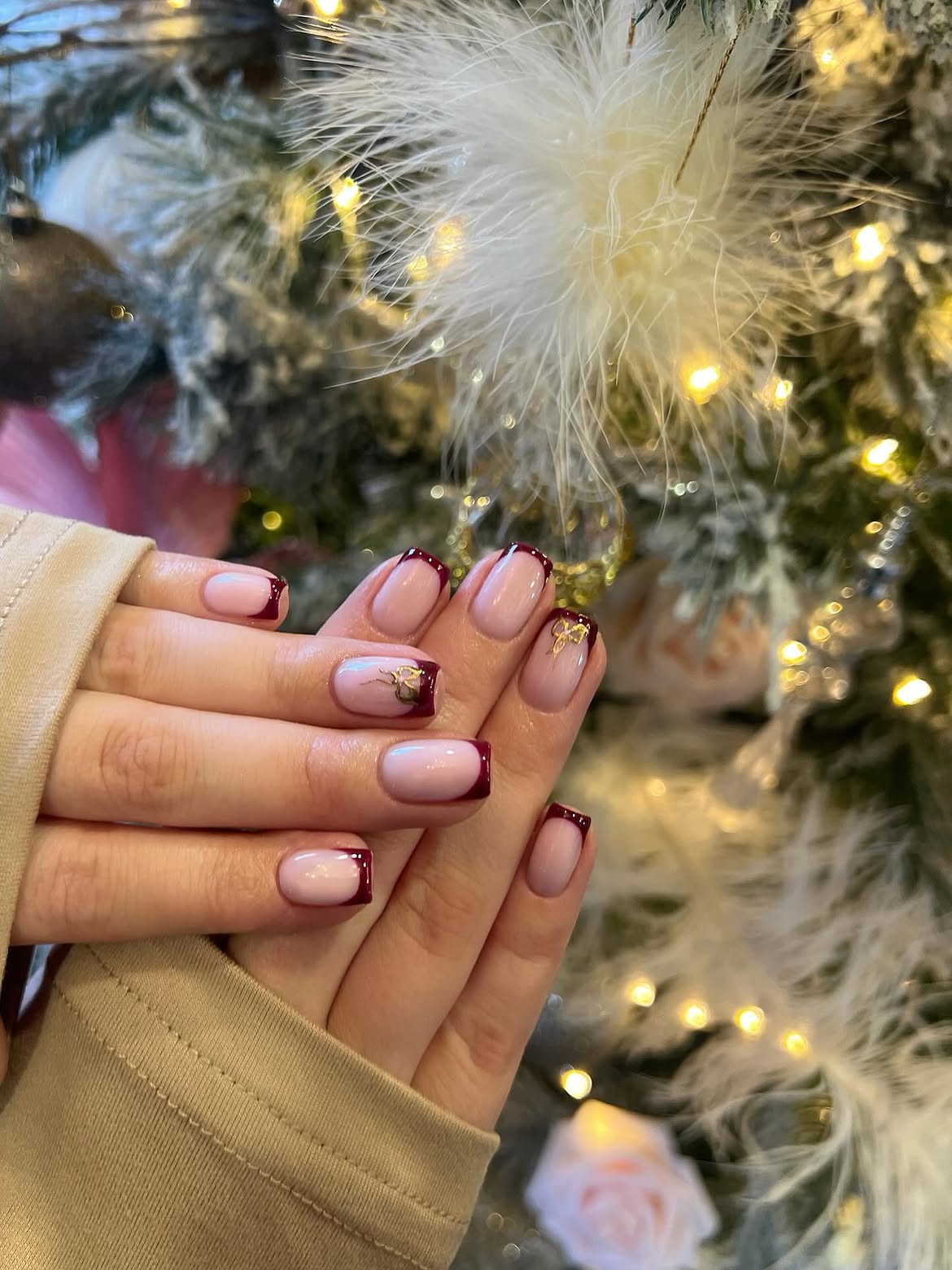 Festive Burgundy French Tip with Gold Bow Accent
