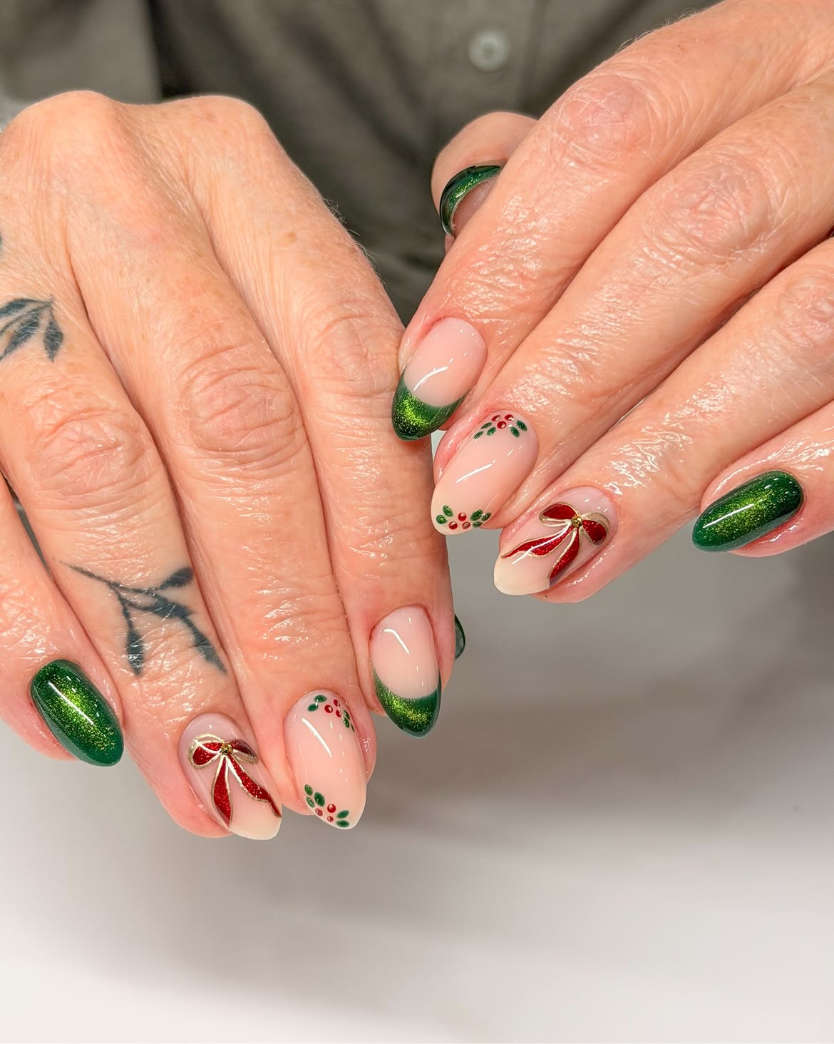 Festive Emerald Green And Red Bow Christmas Nails