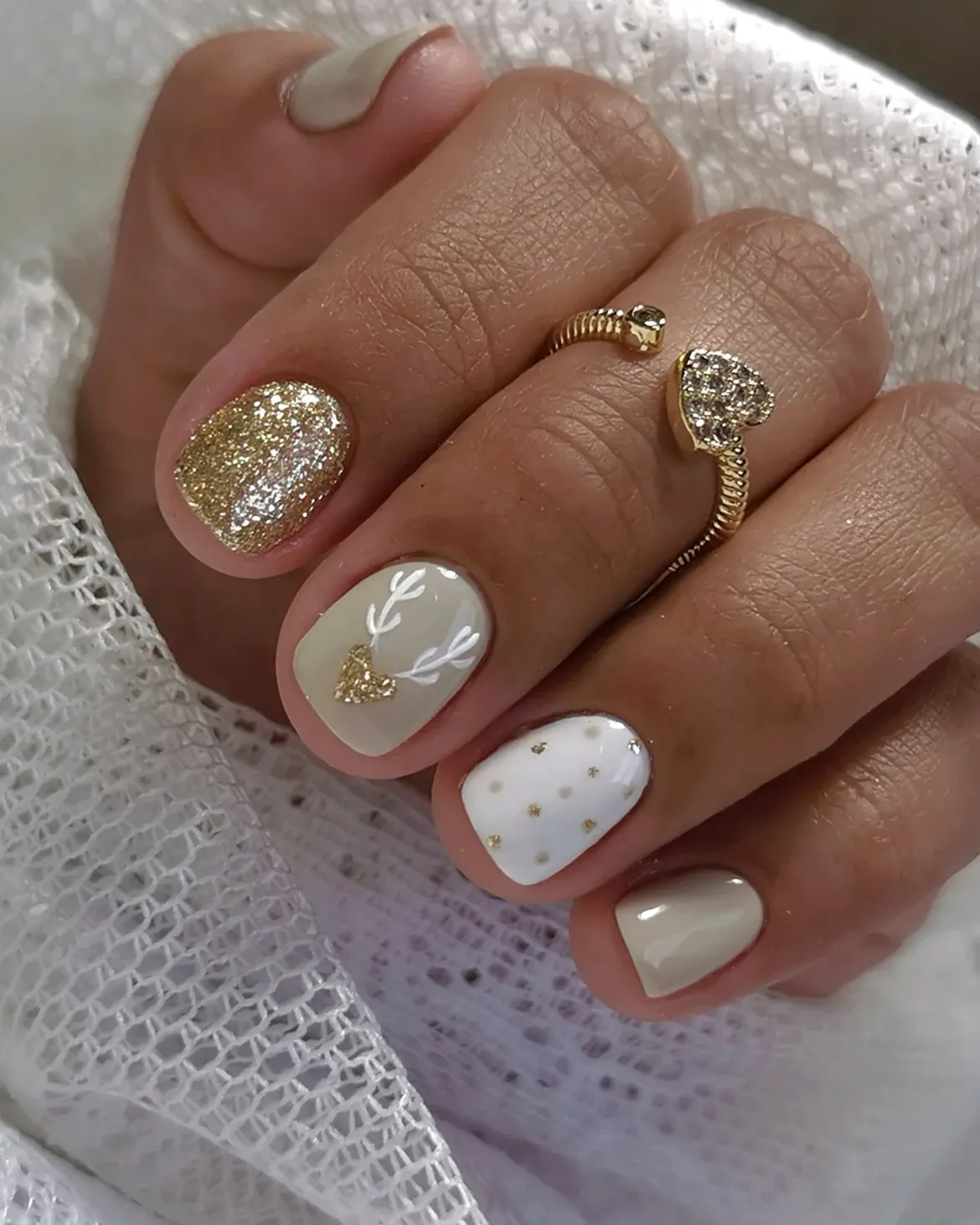 Festive Gold Glitter and Reindeer Christmas Nails
