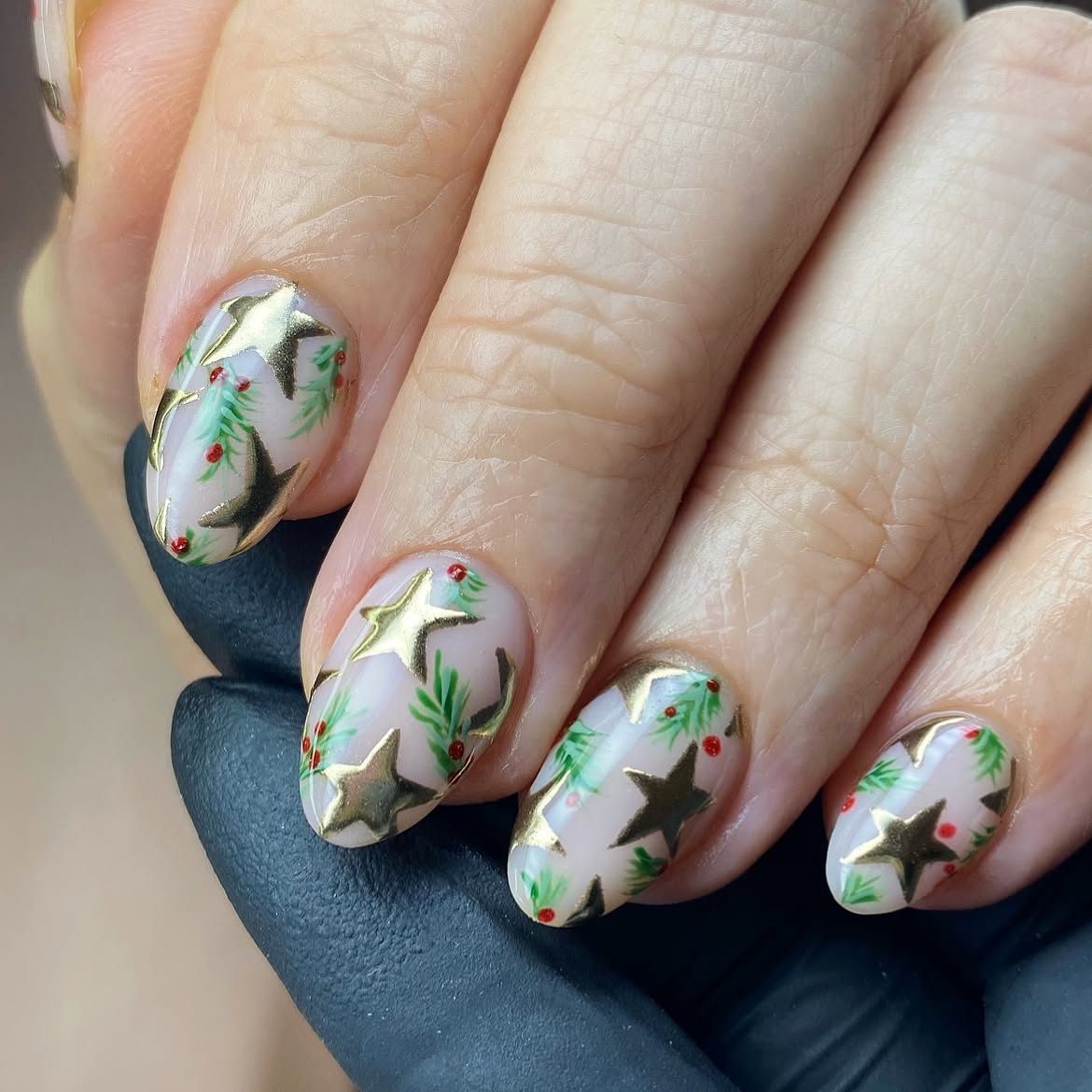 Festive Gold Star And Pine Almond Winter Nails