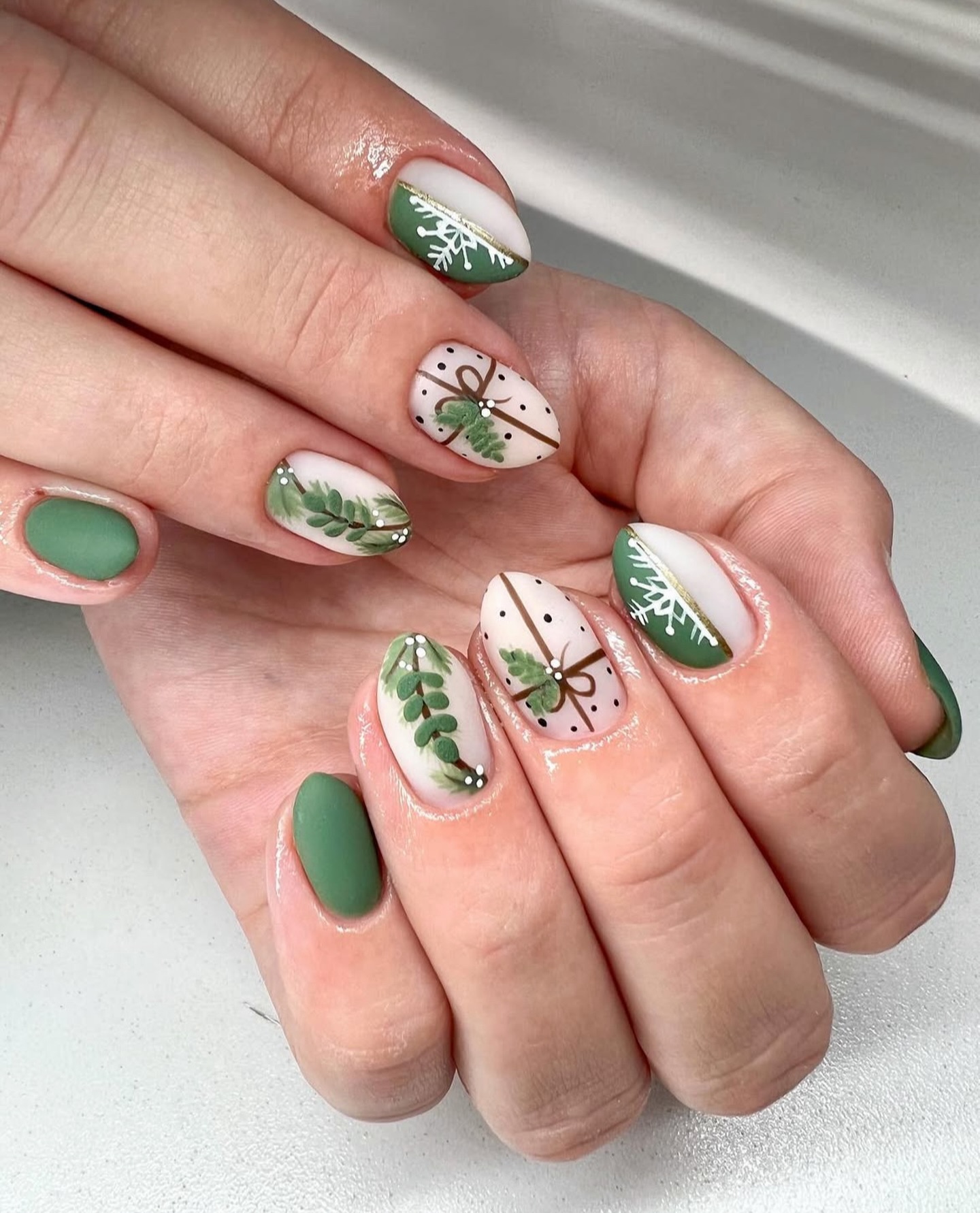 Festive Green Christmas Gift and Snowflake Nails