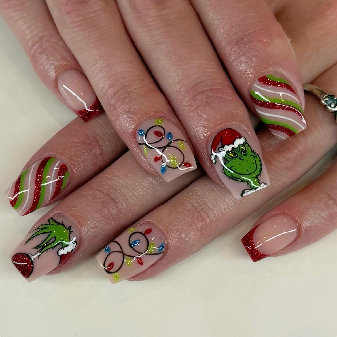 Festive Grinch And Christmas Lights Nail Art
