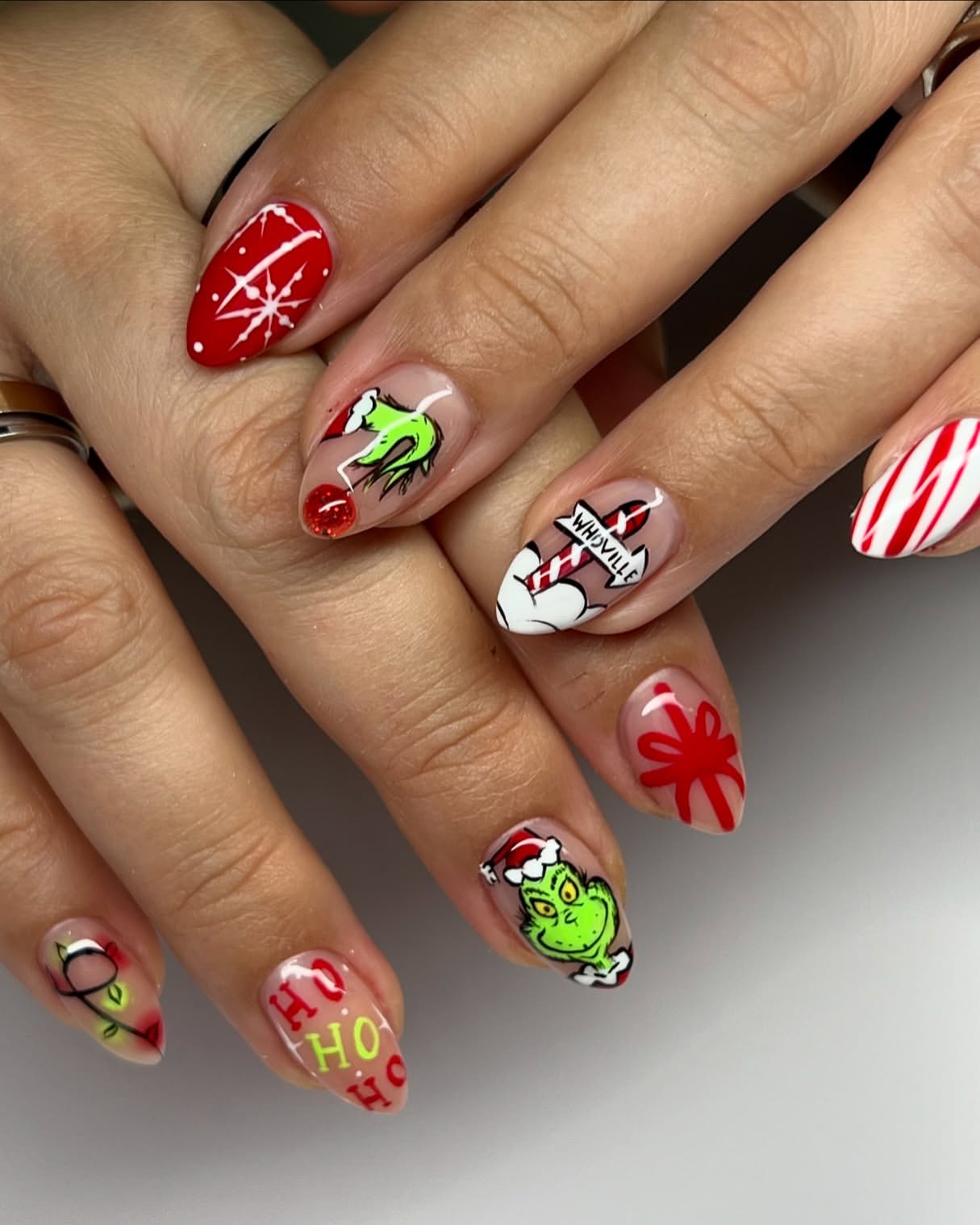 Festive Grinch Hand Painted Holiday Almond Nails