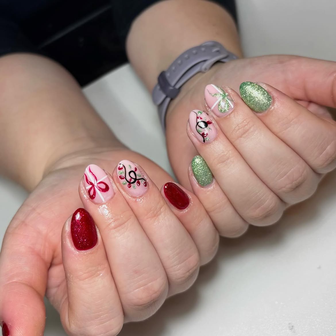 Festive Holiday Lights And Gift Bow Nail Art