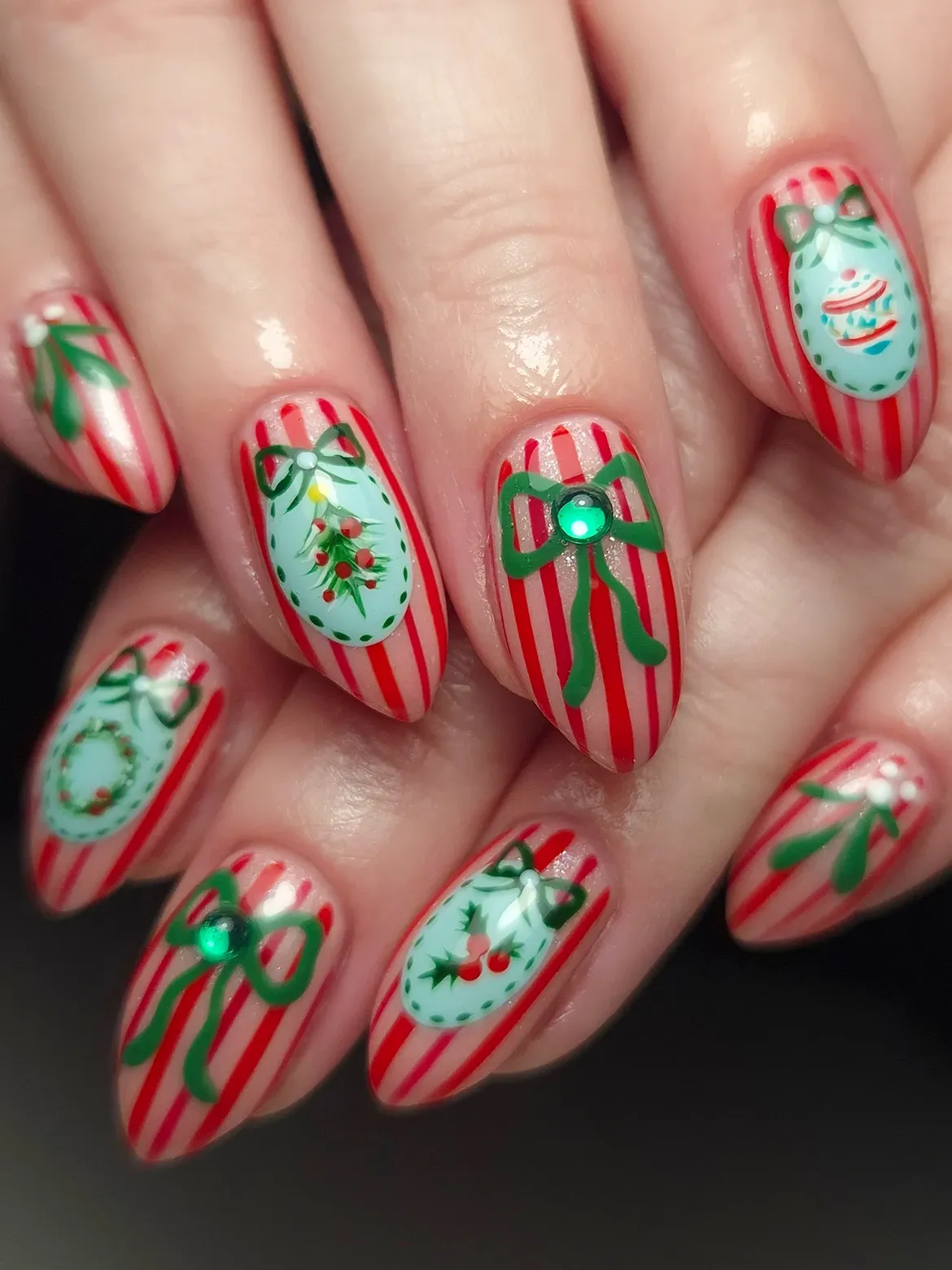 Festive Ornament and Candy Cane Stripe Almond Nails