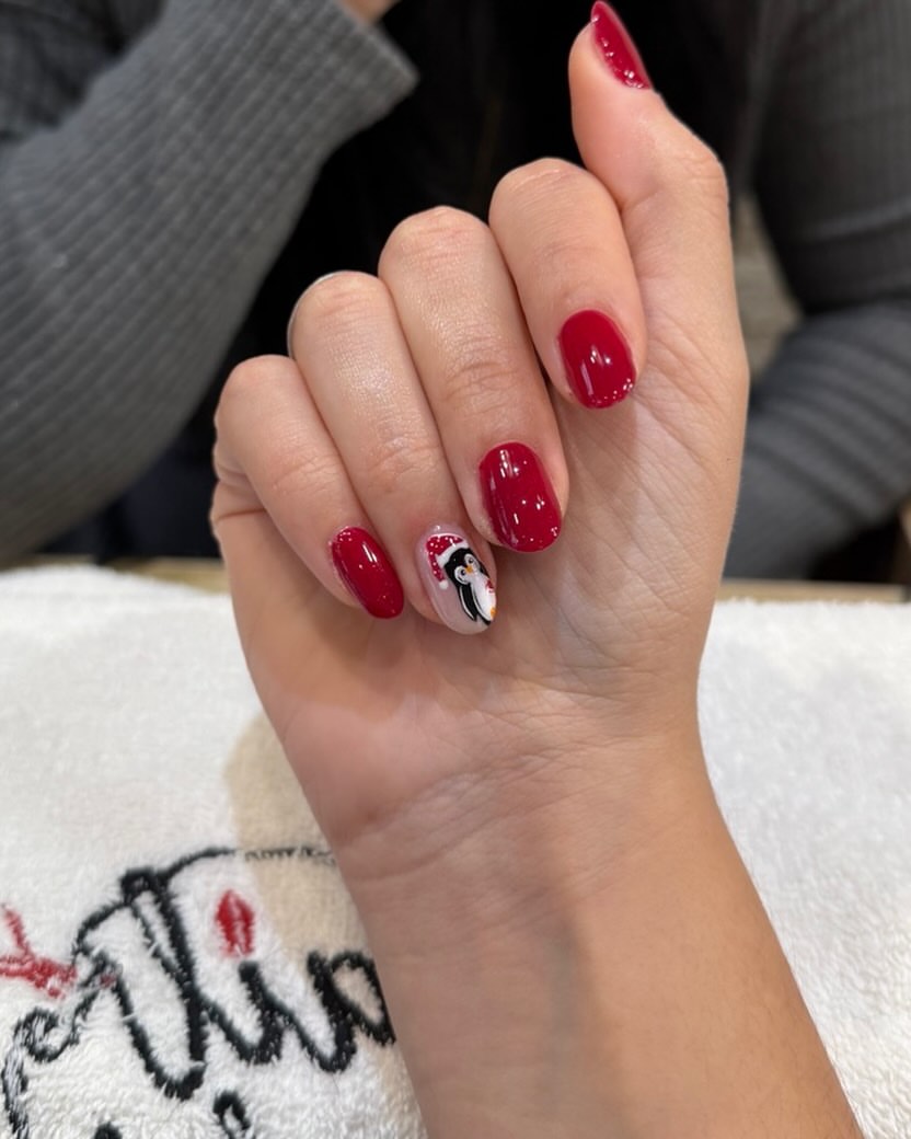 Festive Penguin Christmas Nails