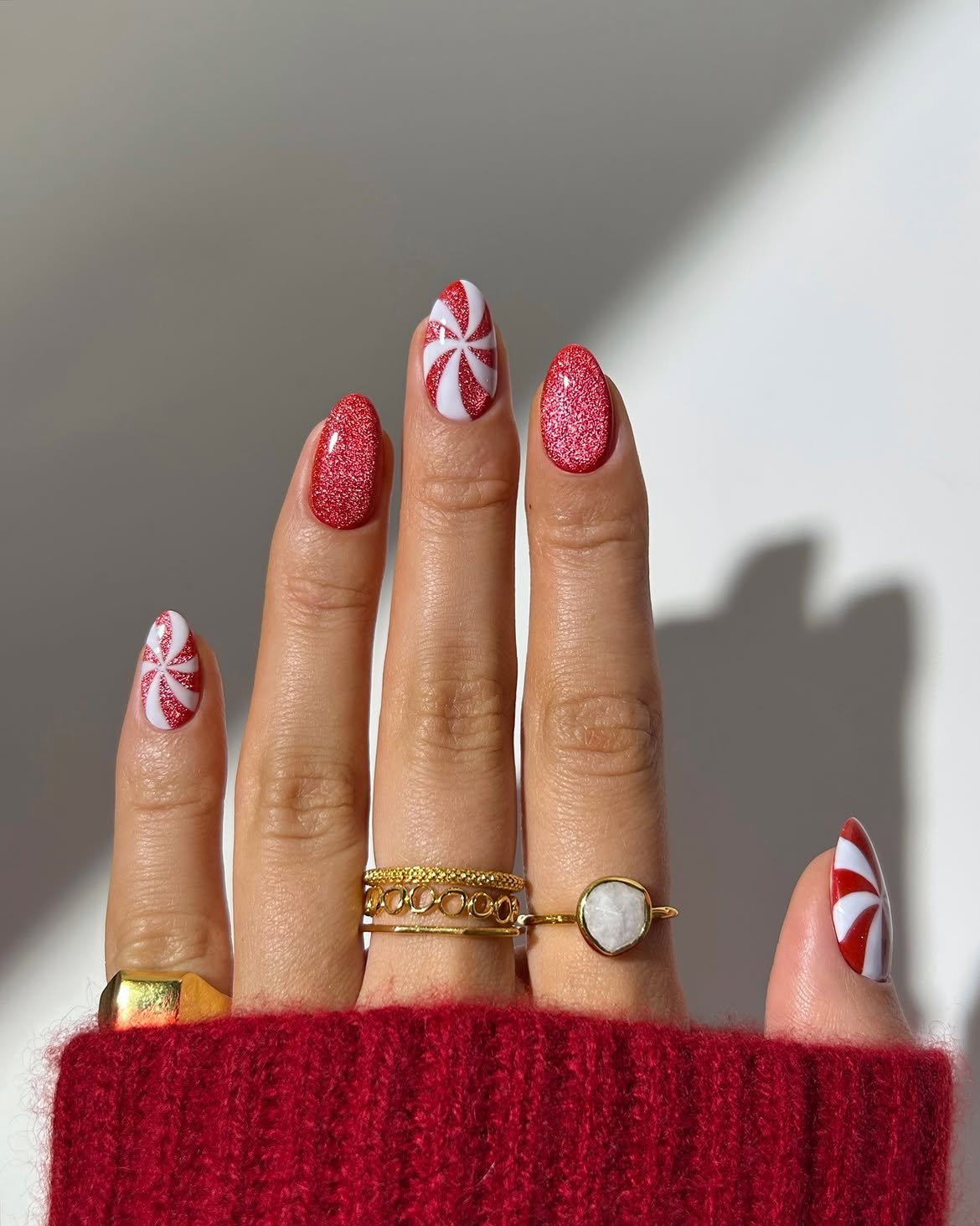 Festive Peppermint Swirl Glitter Almond Christmas Nails