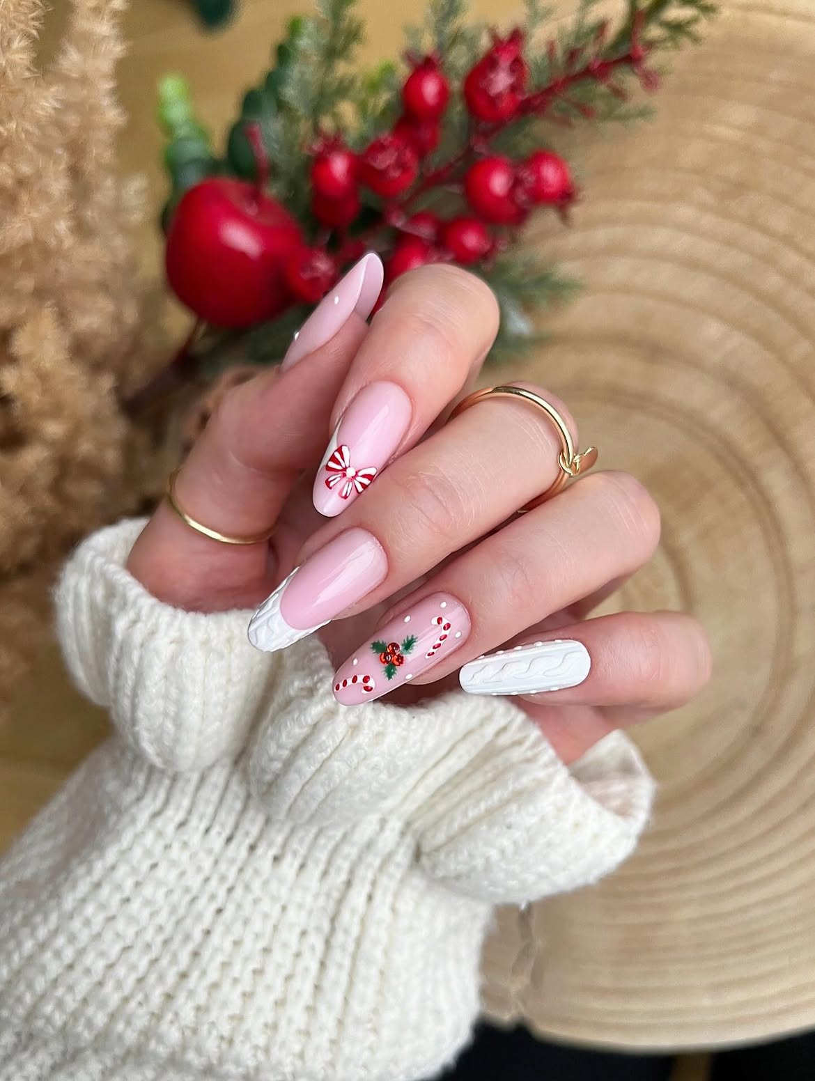 Festive Pink Almond Nails With 3D Bows And Knit Art