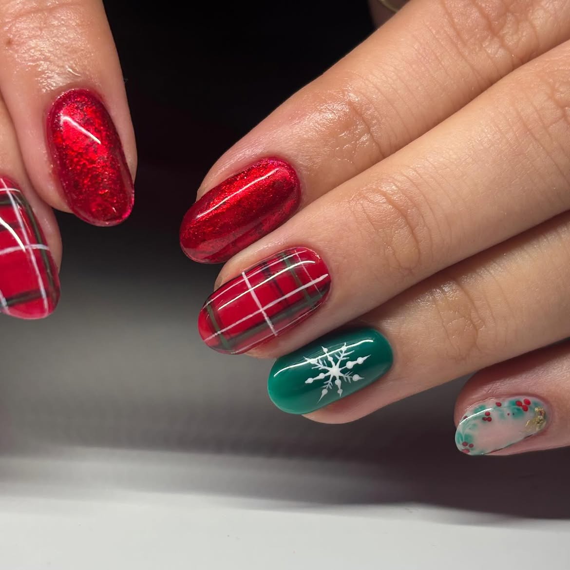 Festive Plaid and Snowflake Almond Winter Nails