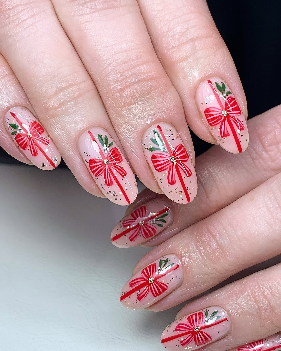 Festive Red Bows with Gold Accents and Glitter