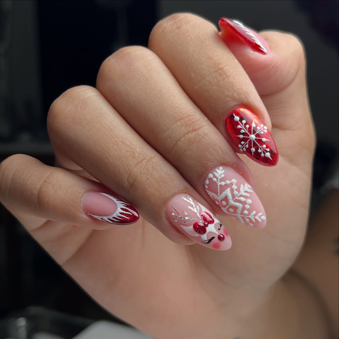 Festive Red Snowflake Reindeer Almond Nails