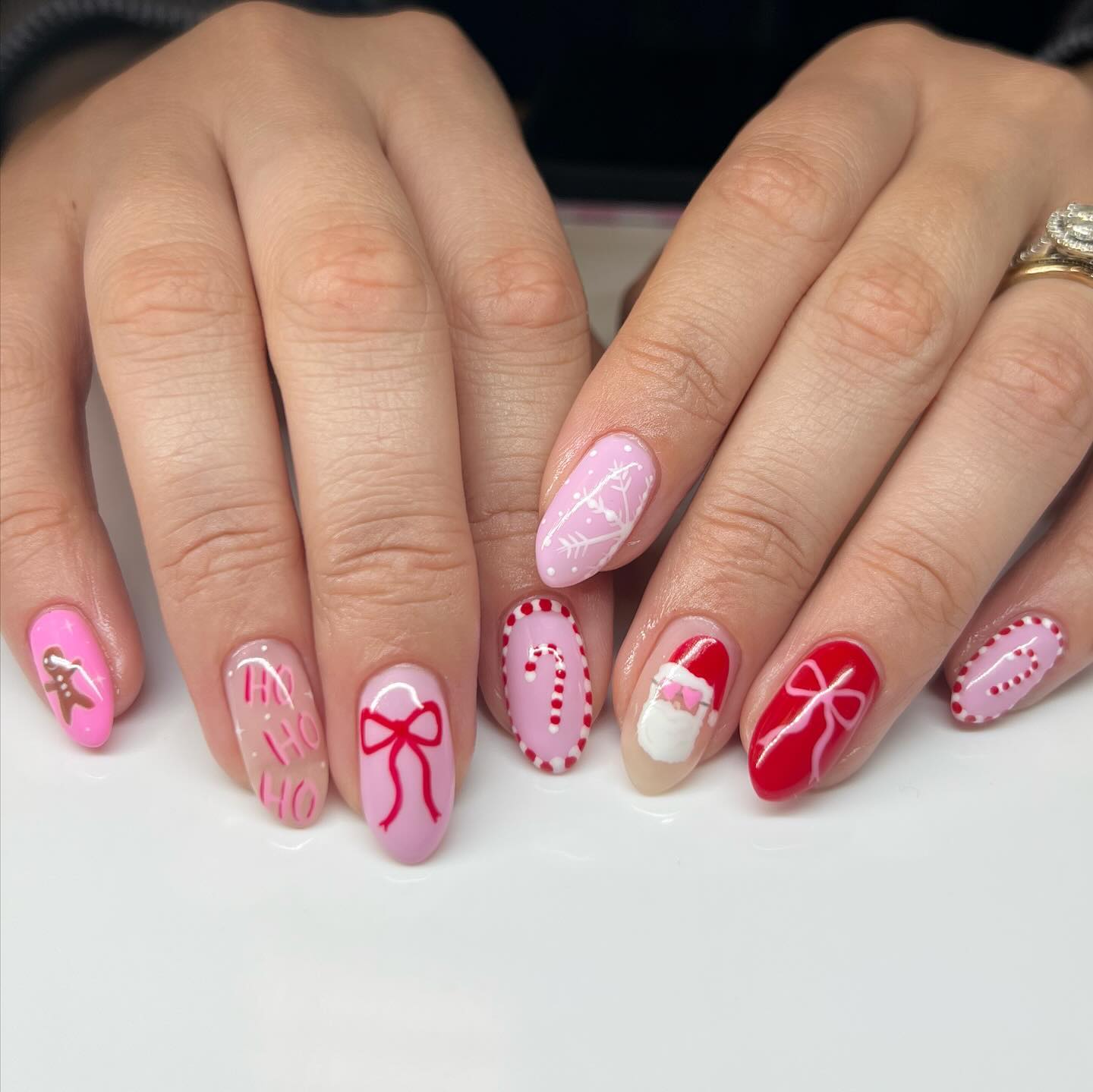 Festive Santa Hat & Christmas Icons Oval Nails