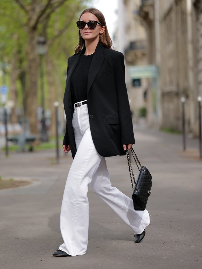 Crisp white ultra wide leg jeans with a black blazer Crisp white ultra wide leg jeans with a black blazer — Flare Jeans Outfits