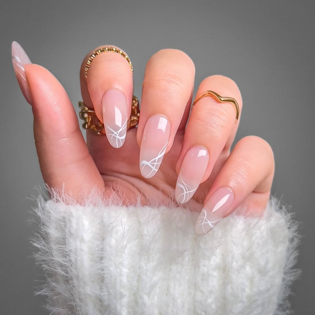 Sheer Pink White Line Art Medium Almond Nails, Close-Up Take Sheer Pink White Line Art Medium Almond Nails, Close-Up Take — Formal Nails