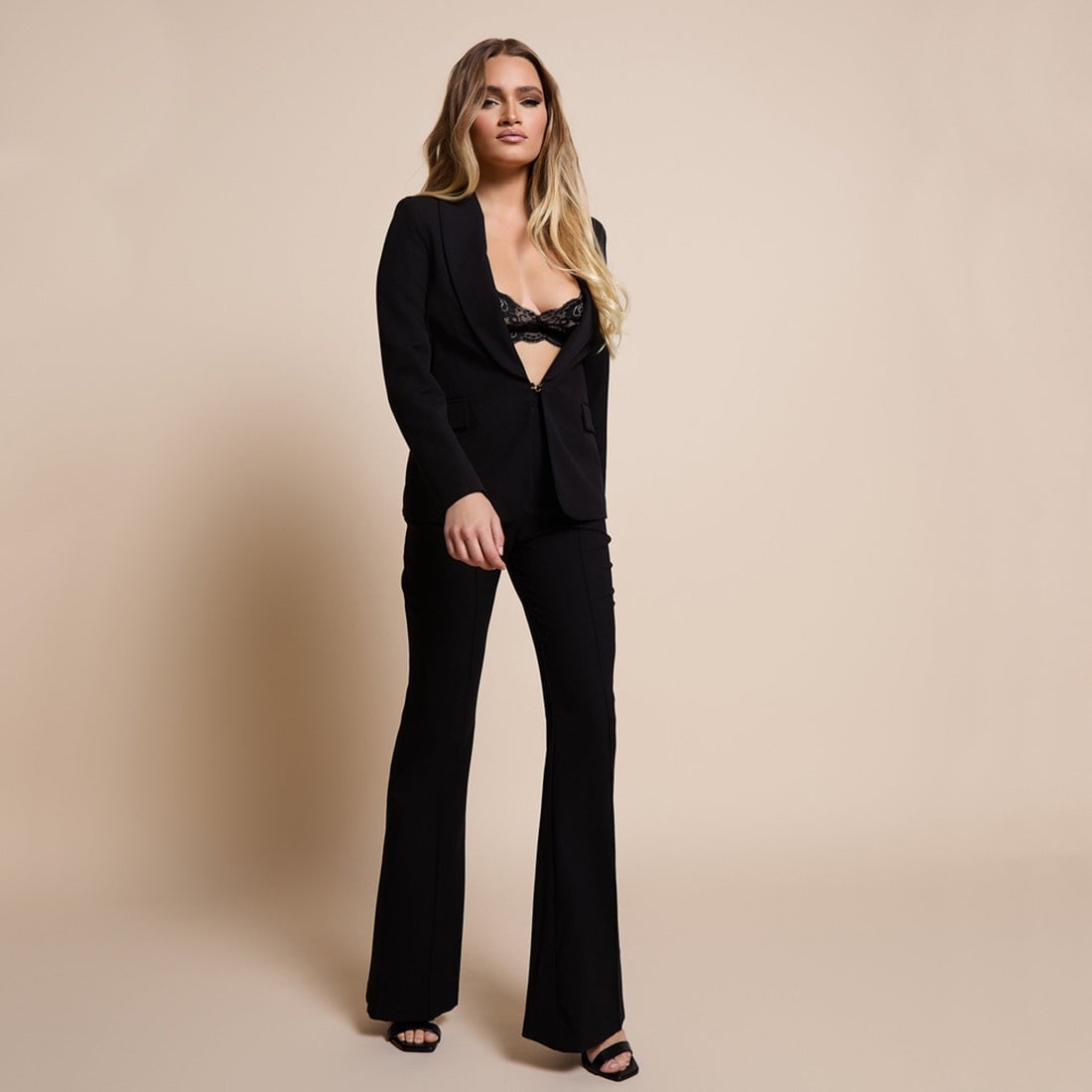 Black blazer with lace bra and flared trousers Black blazer with lace bra and flared trousers — Formal Style
