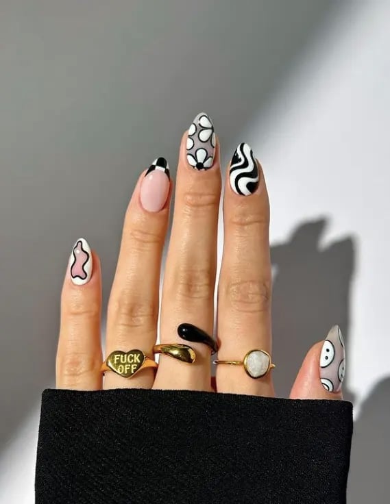 Medium Almond Nails With Bold Graphic Patterns Medium Almond Nails With Bold Graphic Patterns — Funky Nails