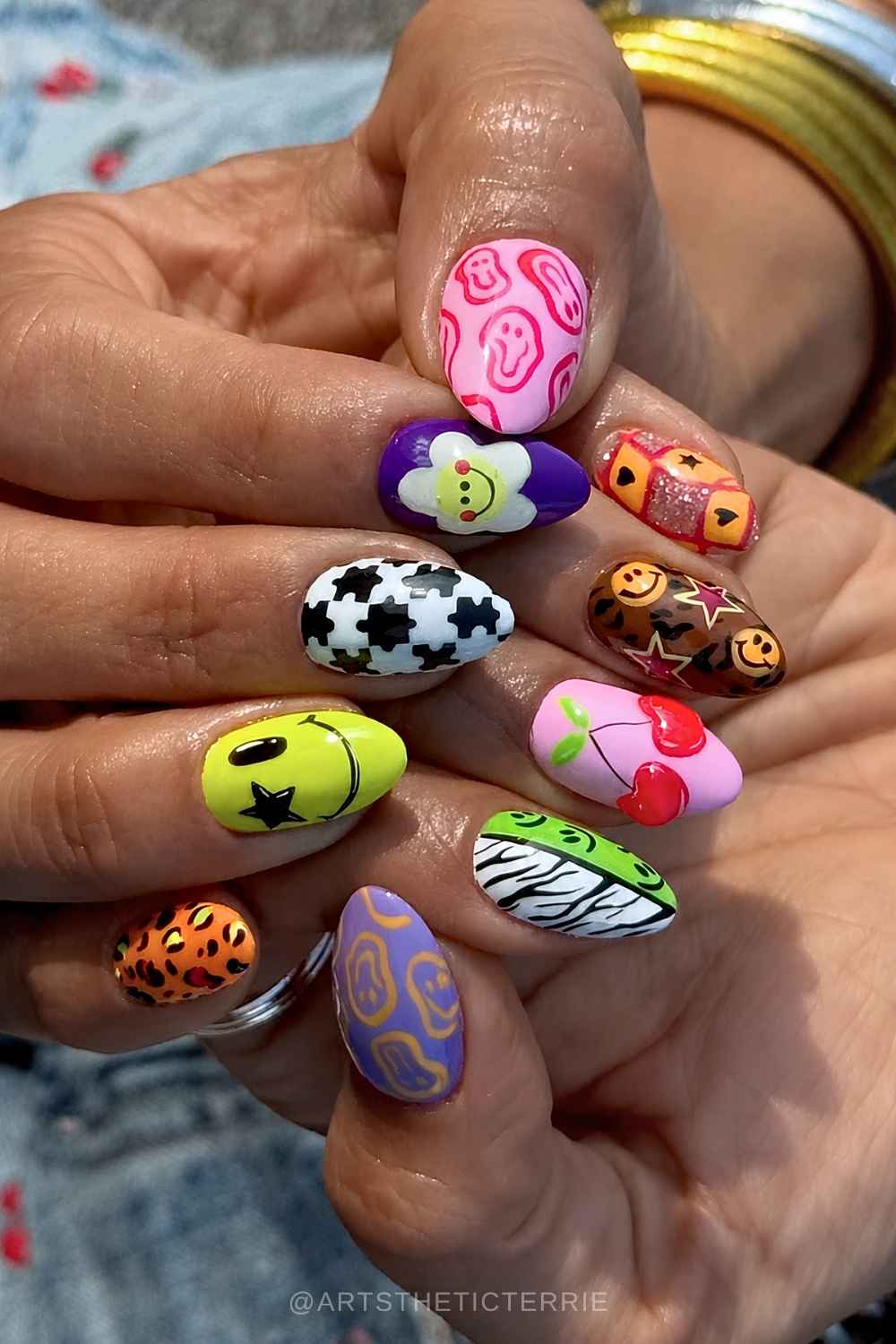 Short to Medium Almond Nails With Mixed Funky Motifs Short to Medium Almond Nails With Mixed Funky Motifs — Funky Nails