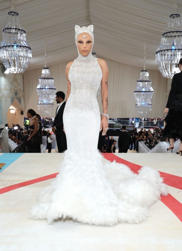 White Halter Gown With Feathered Train White Halter Gown With Feathered Train — Gala Outfits