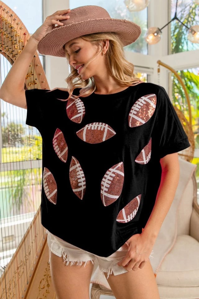 Sequin football print tee with white shorts and pink hat Sequin football print tee with white shorts and pink hat — Game Day Outfits