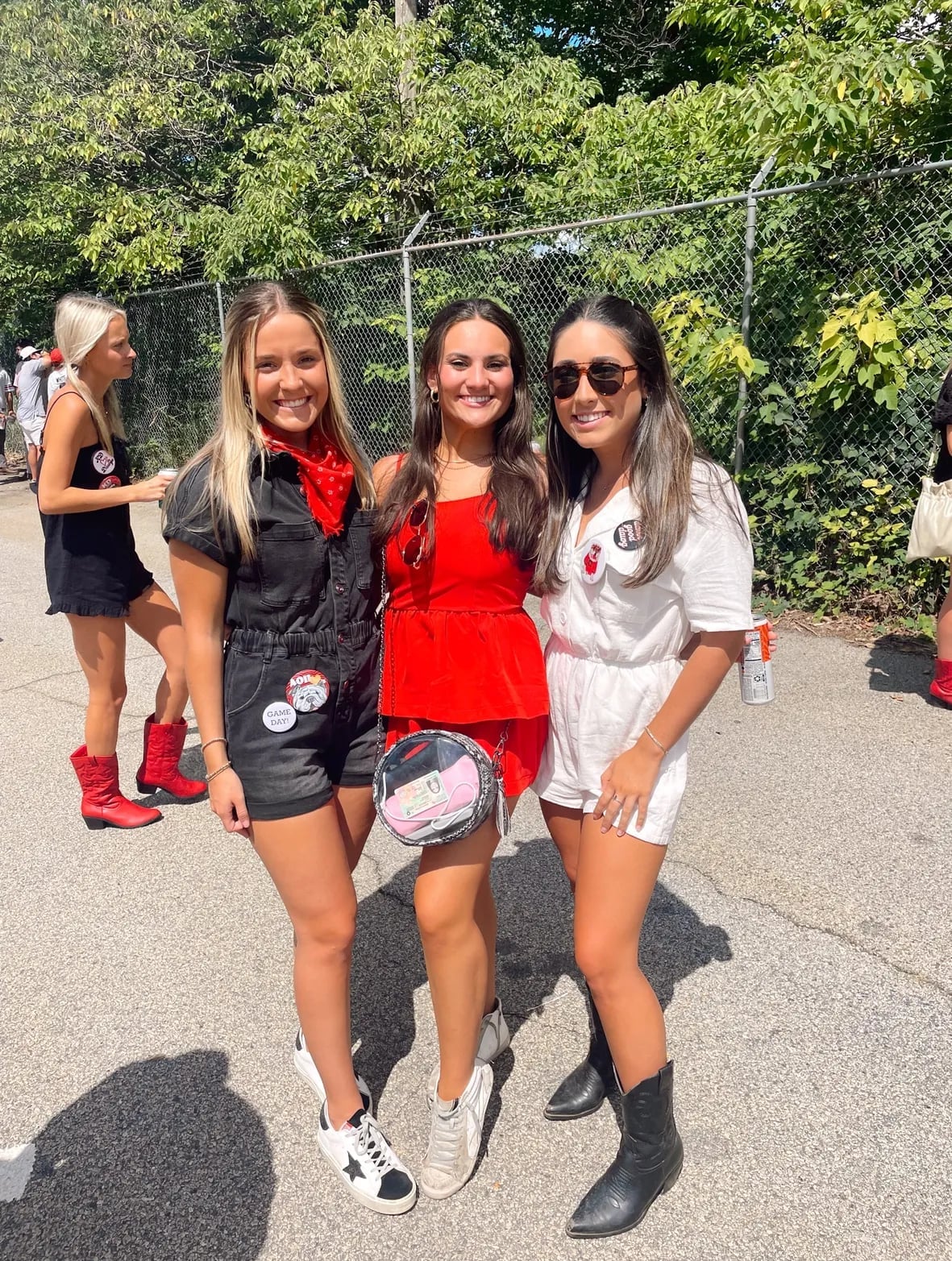 Black denim romper with red bandana and boots, Close-Up Take Black denim romper with red bandana and boots, Close-Up Take — Game Day Outfits
