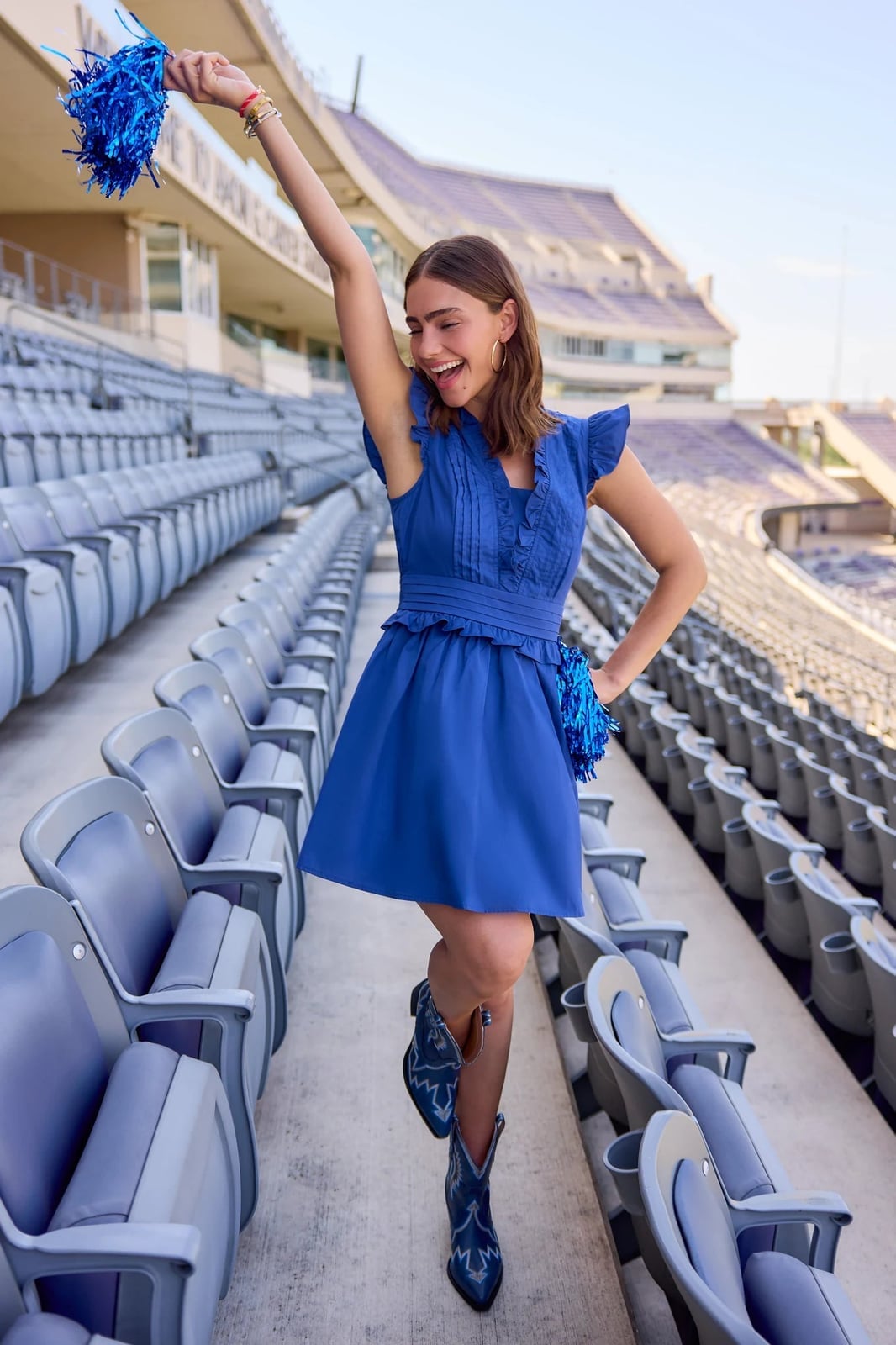 Royal blue fit and flare dress with cowboy boots Royal blue fit and flare dress with cowboy boots — Game Day Outfits
