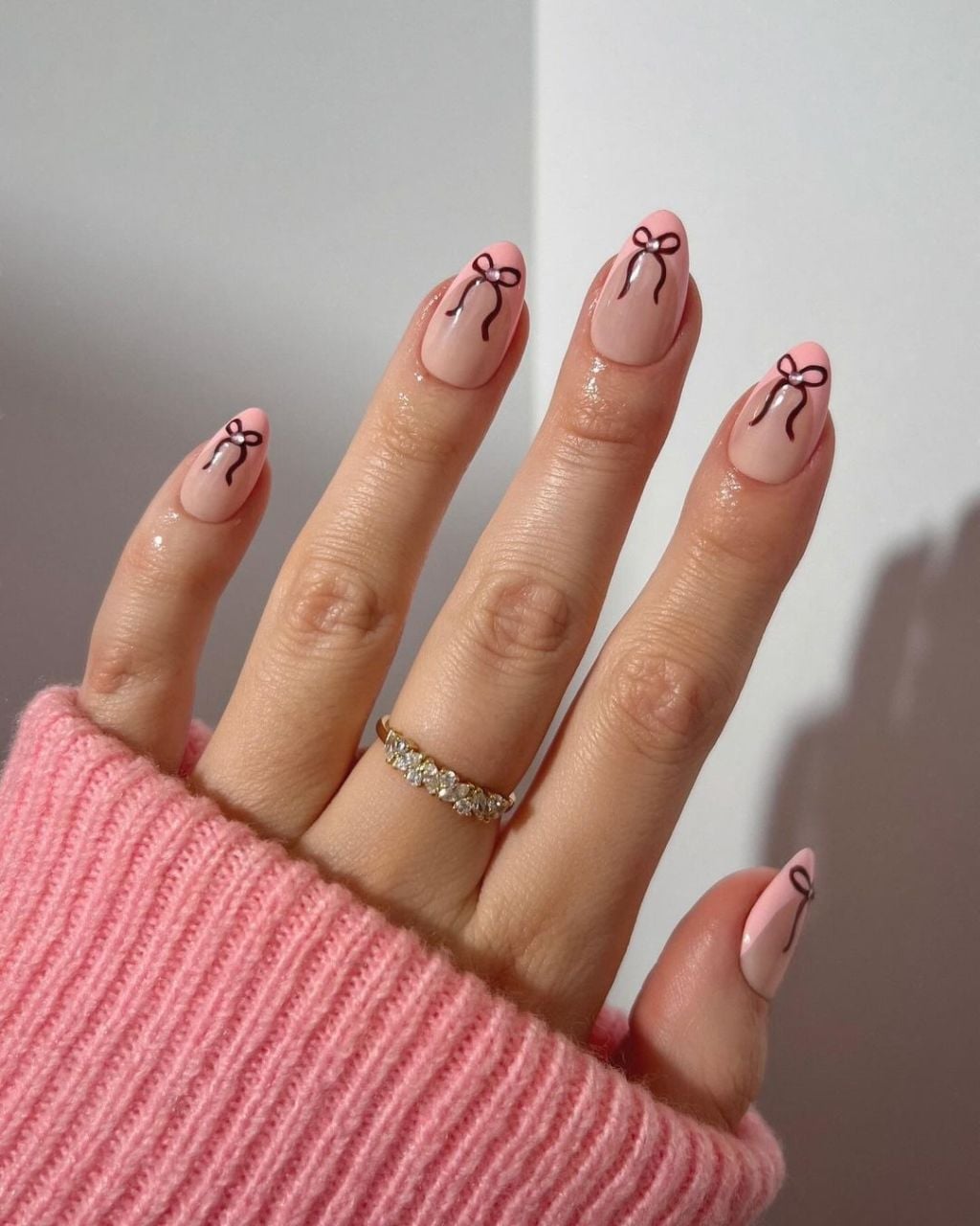 Medium Almond Glossy Sheer Pink Black Bow Gel Nails Medium Almond Glossy Sheer Pink Black Bow Gel Nails