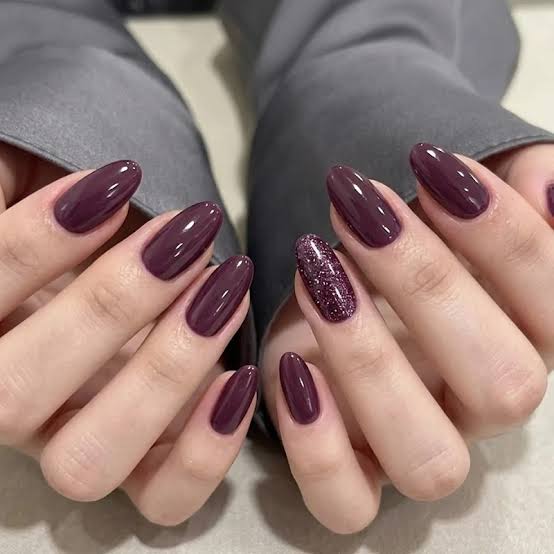 Deep Plum Glitter Accent Glossy Medium Oval Nails Deep Plum Glitter Accent Glossy Medium Oval Nails — Gel Nails Colors