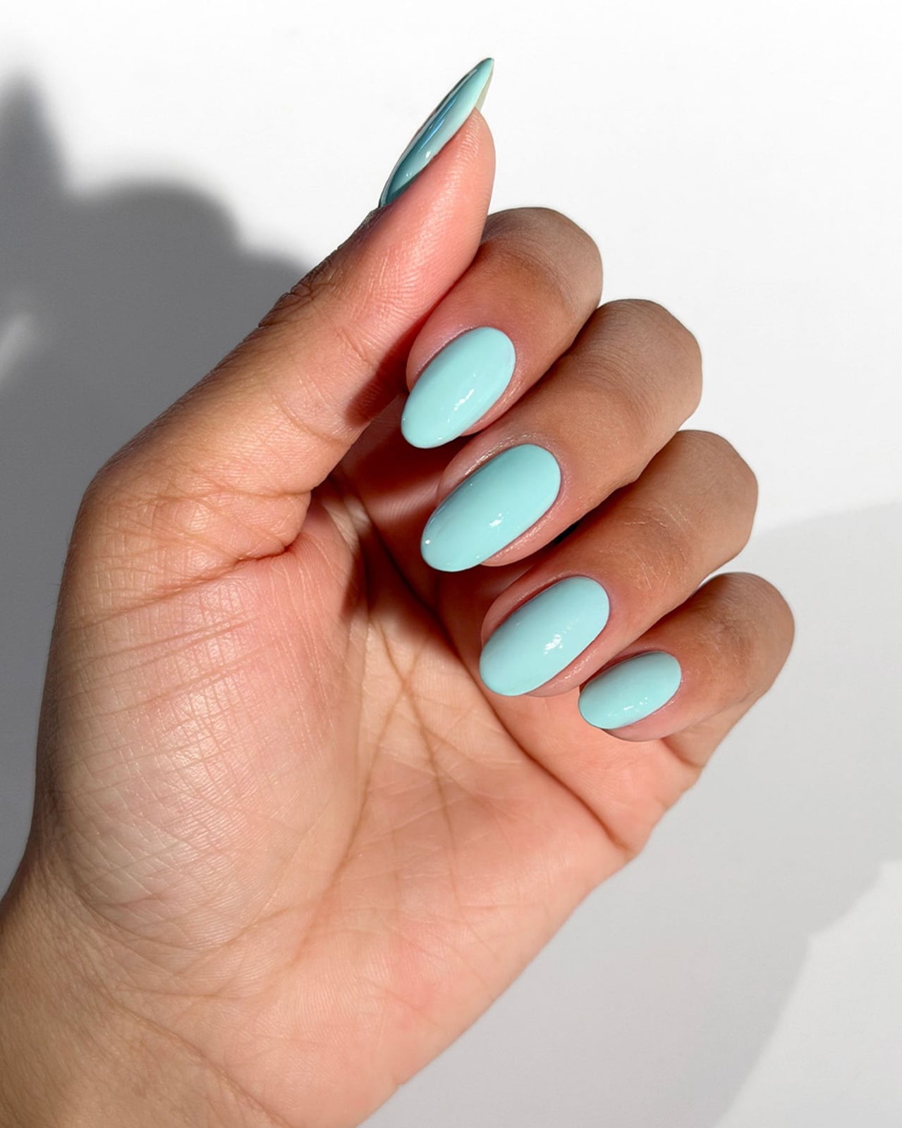 Bright Aqua Blue Glossy Medium Almond Nails Bright Aqua Blue Glossy Medium Almond Nails — Gel Nails Colors