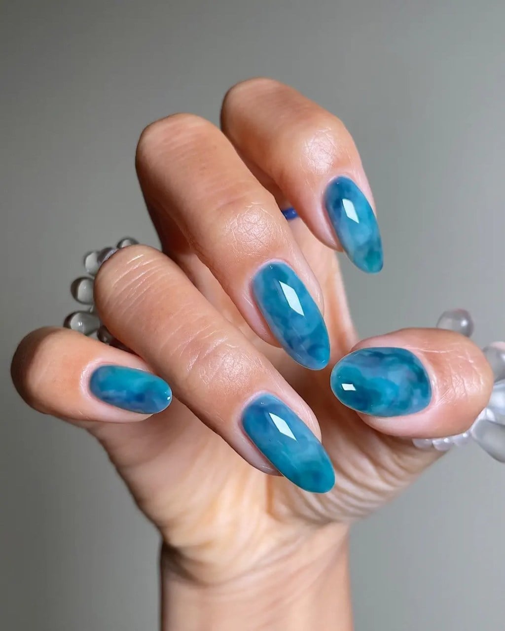 Teal Turquoise White Marble Glossy Long Oval Nails Teal Turquoise White Marble Glossy Long Oval Nails — Gel Nails Colors
