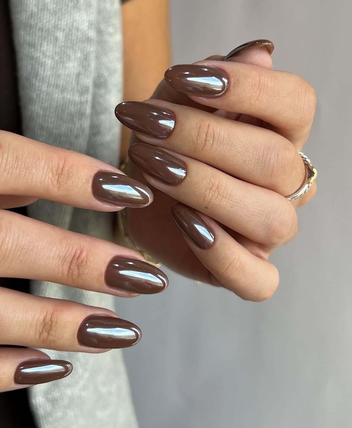 Glossy Chocolate Chrome Almond Nails