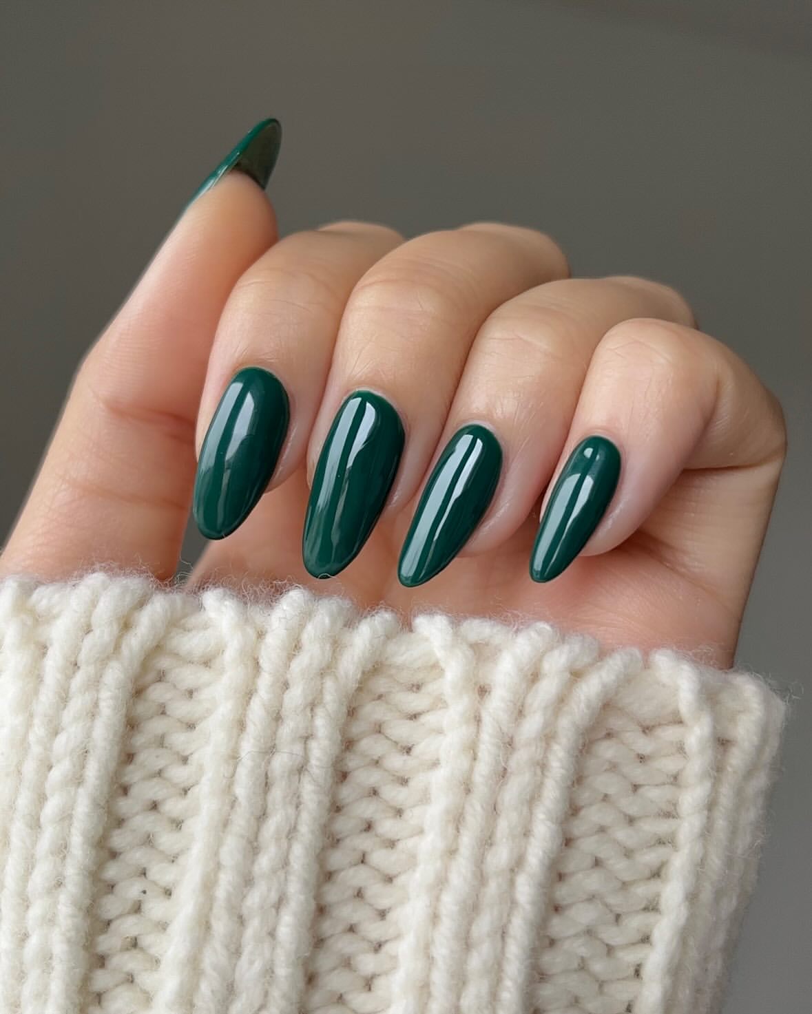 Glossy Dark Green Almond Winter Nails
