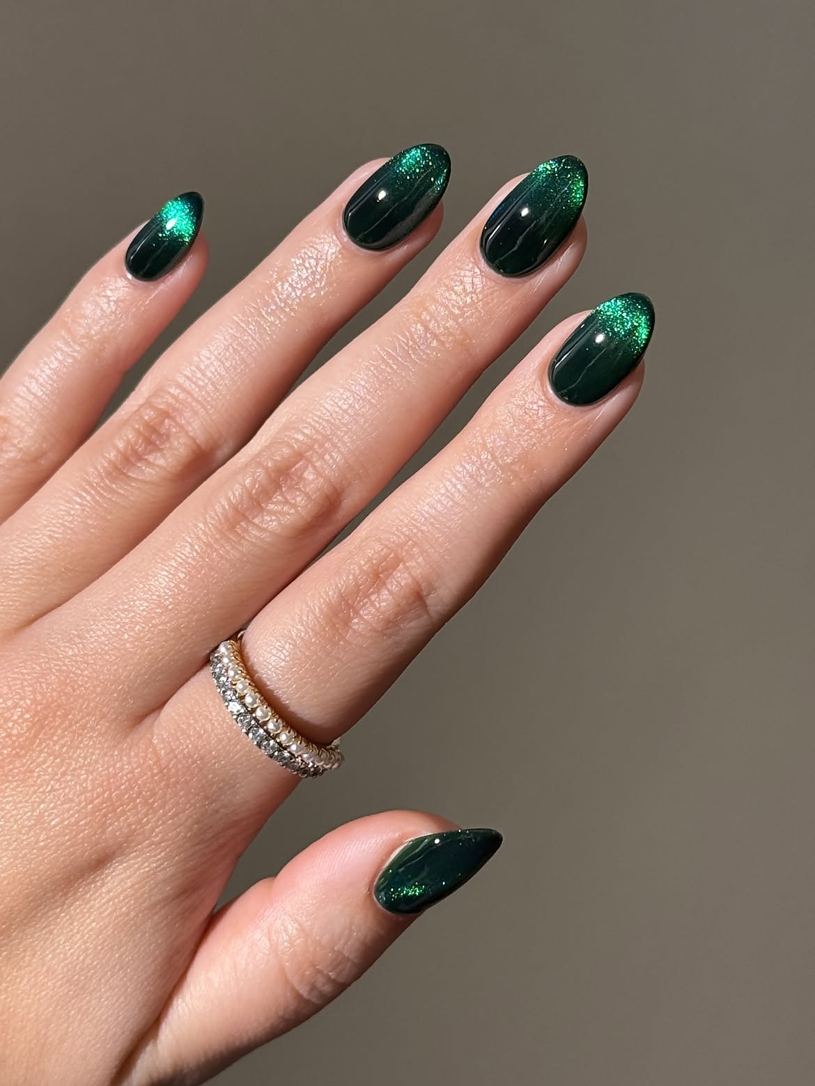 Glossy Dark Green Cat Eye Almond Nails